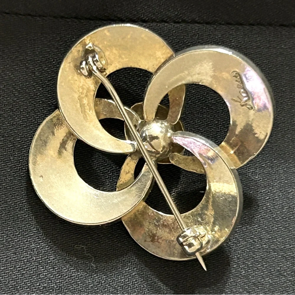 Vintage elegant signed brooch.